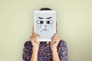 Girl hiding her face